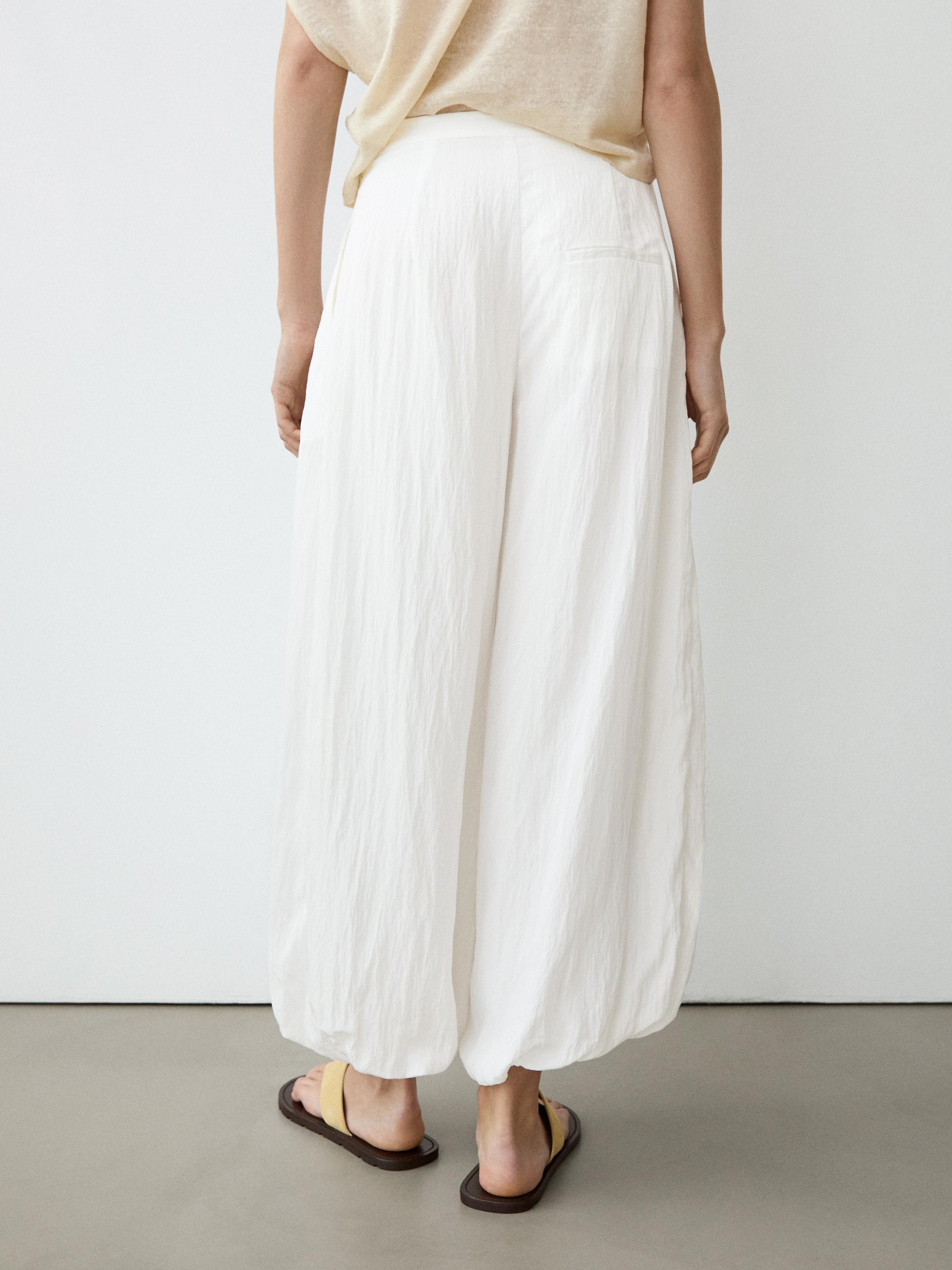 Flowing sarouel trousers with textured detail